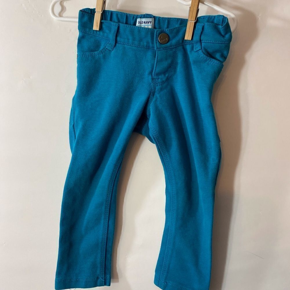 2T jeggings that are teal colored